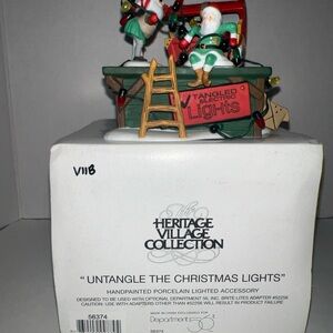 Dept. 56 Heritage Village Collection Untangle the Christmas Lights # 56374